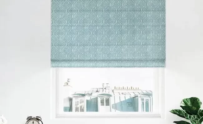 Motorized roman shades